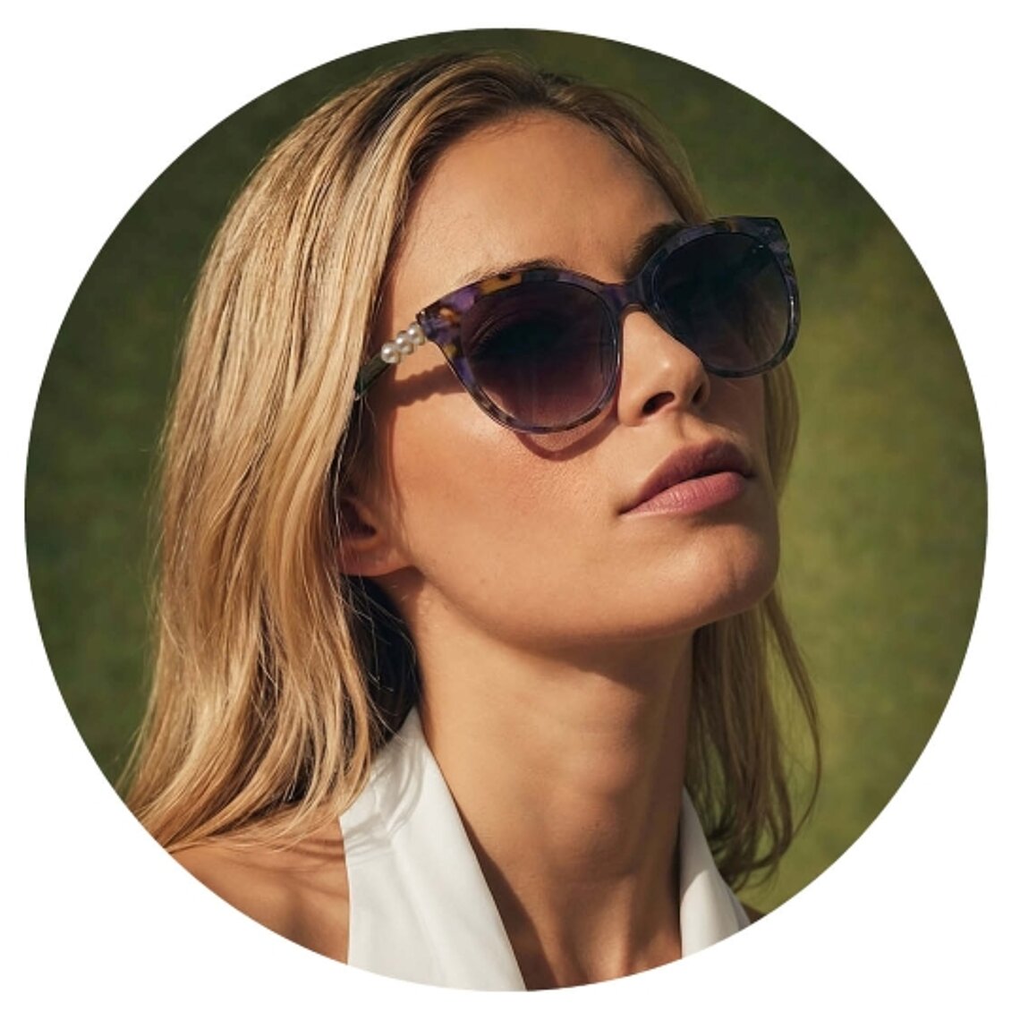 Woman wearing Isaac Mizrahi New York sunglasses